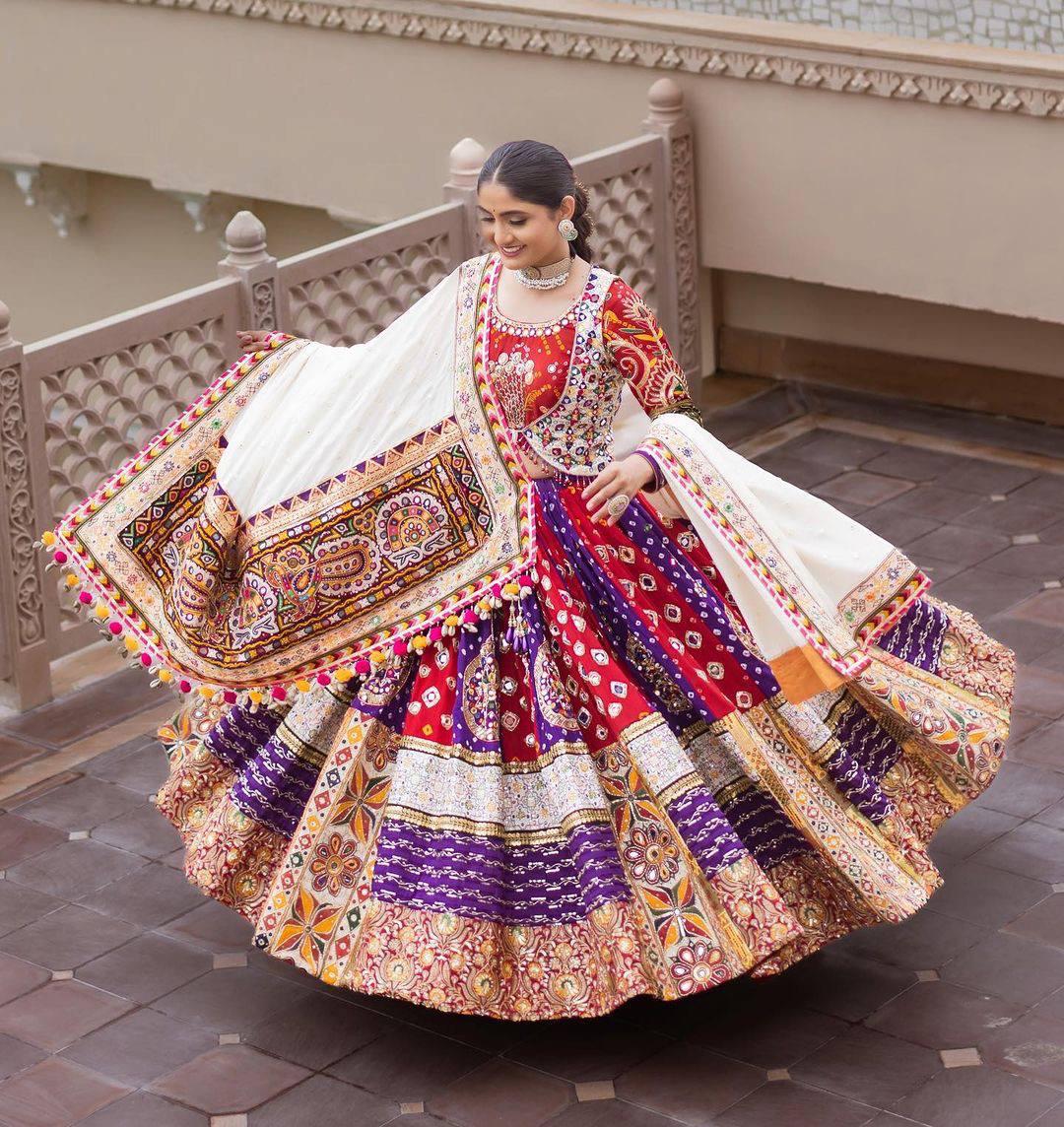 Attractive Multi Color Heavy Mirror Work Navratri Lehenga Choli Bride