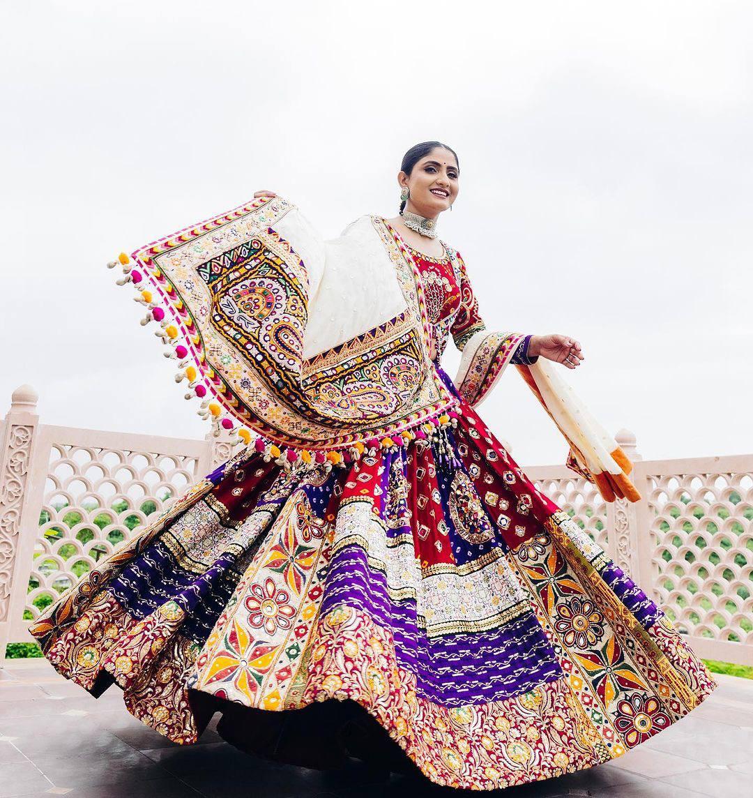 Attractive Multi Color Heavy Mirror Work Navratri Lehenga Choli Bride